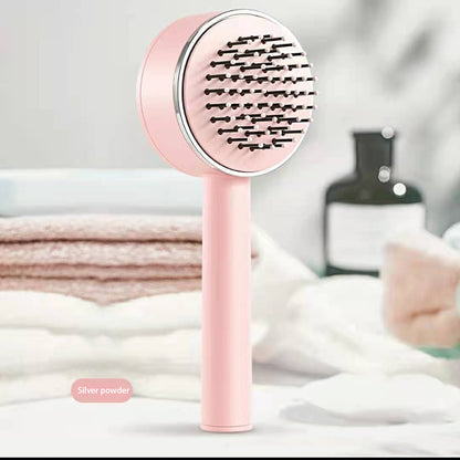 Selbstreingende Haarbürste mit Massageeffekt